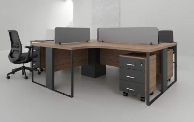 This is Sync 4 Cluster L Shaped Workstation.This table is crafted with environmentally friendly & Scratch-resistant Wood, concrete-finished MFC materials & a TGIC powder-coated flat bar MS frame